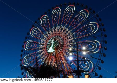 Peacock Ferris Wheel, Photographed In The Colorful Happy World Of Yunnan
