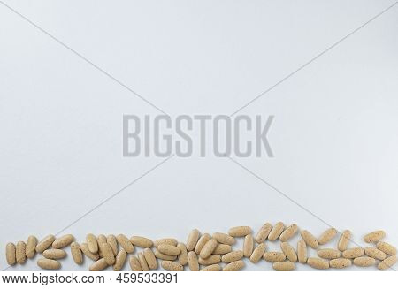 Brown Pills, Medicine Isolated On White Background, Top View
