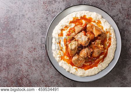 Turkish Food Hunkar Begendi Made With Eggplant And Meat Closeup In The Plate On The Table. Horizonta