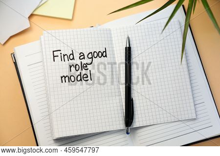 Notebook With Phrase Find A Good Role Model And Pen On Beige Background, Flat Lay