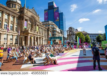 Birmingham, Uk - August 9, 2022.  Crowds Of People Watching The Commonwealth Games 2022 Festival Sit