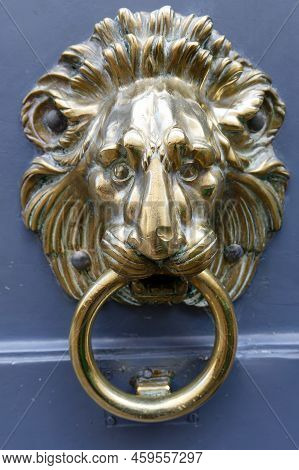 European Vintage Old Metal Wrought Iron Door Knocker. Design Detail. Paris.