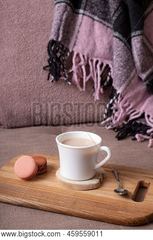 Autumn Mood Background With Cup Of Cocoa, Plaid On Sofa. Hot Drink In Autumn Concept