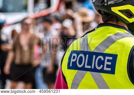 Montreal, Ca - 7 August 2022: Police Written On The Back Of A Policeman Jacket