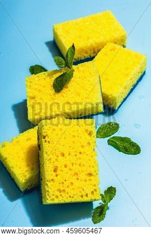 Bright Yellow Sponges For Washing Dishes. Organic Cleaning Concept, Minty Freshness