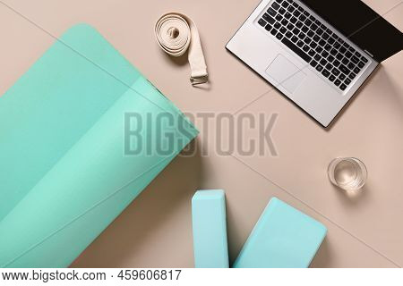 Yoga Practice, Meditation, Learning And Edication. Green Mat, Two Blocks, Water, Clock And White Str