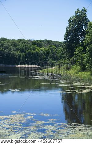 This Is A Quite Lake On A Summer's Day.