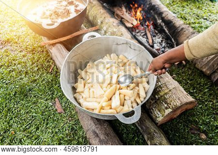 Indigenous Woman Cooking Yucca And Lukluk Soup On The Caribbean Coast Of Nicaragua, Central America