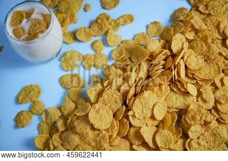 Corn Flakes In A Glass With Milk Top View