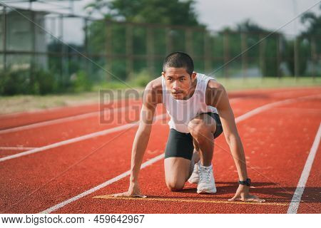 Hands Runner Ready Start To Run Athlete Sportman Training Run On Lane At The Stadium In Morning. Run