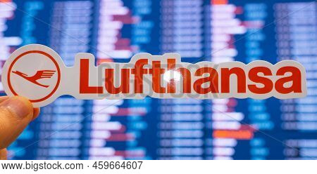 December 11, 2021, Munich, Germany. The Emblem Of Lufthansa Against The Background Of An Electronic 
