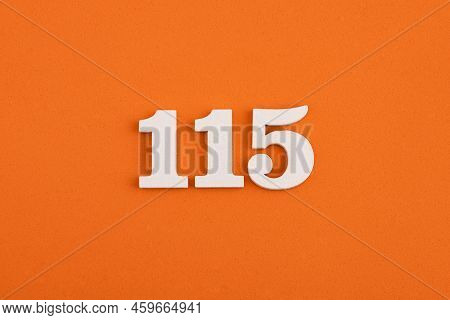 Number 115 - On Orange Foam Rubber Background