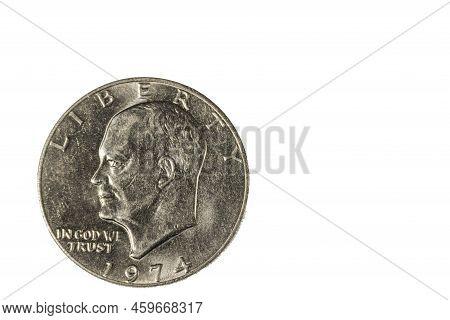Close Up Of One Dollar Shaped Coin Dated 1974 On Front Side. Numismatic Concept.