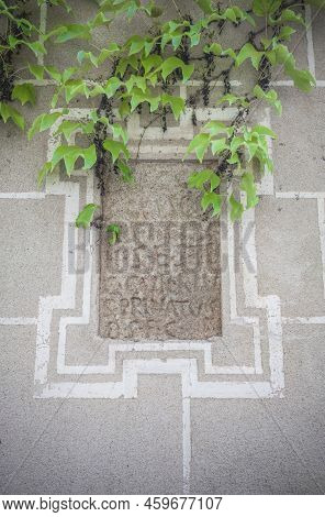 Roman Tombstone Built In Historic Quarter House. Roman Remains Still Visible At Sande Palace, Cacere