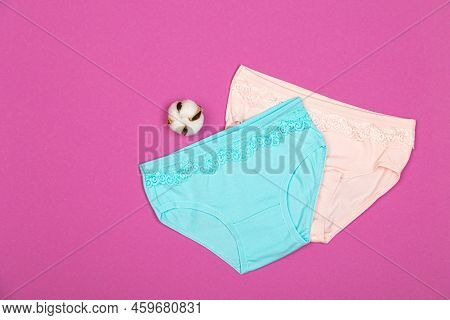 Clothes For Children In The Form Of Panties On A Pink Background. Clothes For Children From Soft Fab