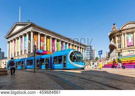 Birmingham, Uk - July 28, 2022.  A West Midlands Metro Tram Travelling Along Tracks At Victoria Squa