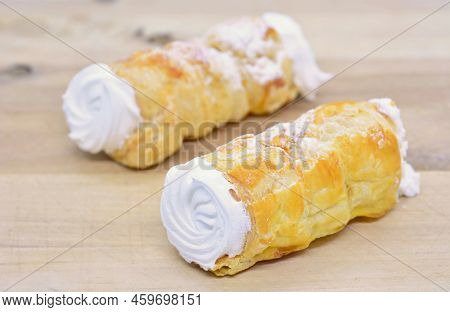 Sweet Traditional Czech Baked Crispy Tube Originally Named Kremrole. Traditional Kremrole Tube Is Fi