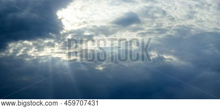 A Dark Grey Stromy Clouds In The Sky