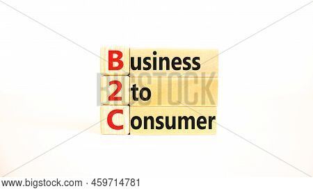 B2c Business To Consumer Symbol. Concept Words B2c Business To Consumer On Wooden Blocks On A Beauti