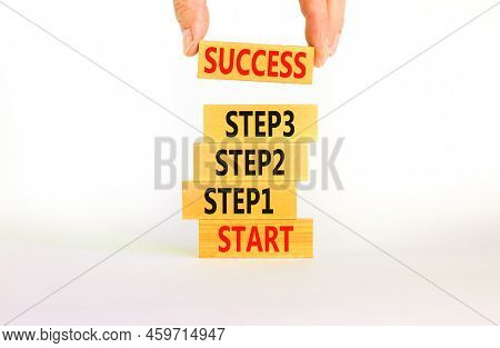 Strat, Step And Success Symbol. Concept Words Start Step 1 2 3 Success On Wooden Blocks On A Beautif