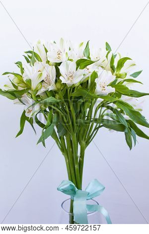 A Colorful Bouquet Of Alstroemeria In A Transparent Vase On The Windowsill In A Cafe. Bouquet Of Als