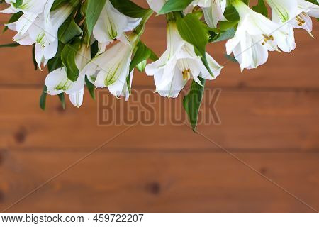 A Colorful Bouquet Of Alstroemeria In A Transparent Vase On The Windowsill In A Cafe. Bouquet Of Als