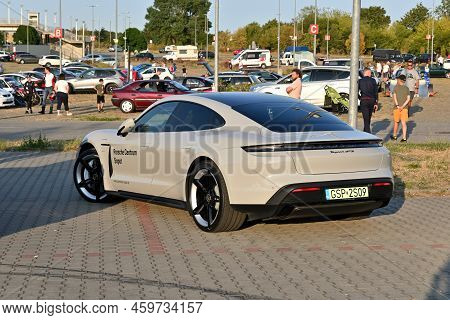Gdansk, Poland - August 12, 2022: Electric Porsche Taycan Gts On The City Street