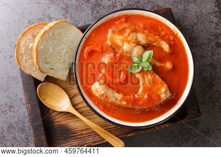 Thick Hearty Soup With Carp Steak, Vegetables And Paprika Close-up In A Bowl On The Table. Horizonta