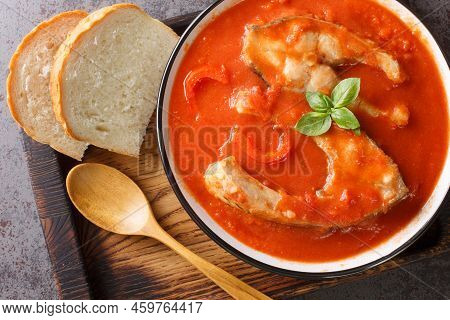Fishermans Soup Or Halaszle Is A Hot, Spicy Paprika Based Fish Soup Closeup In The Bowl On The Woode