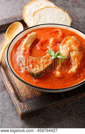 Tomato Soup With River Fish Carp, Vegetables And Paprika Close-up In A Bowl On The Table. Vertical