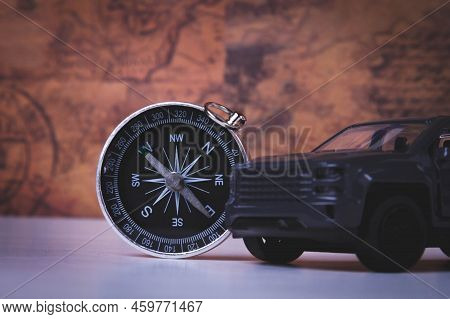 Tourist Travel By Car. Travel By Car. Compass And Car. Autotourism. Traveling Across Countries By La