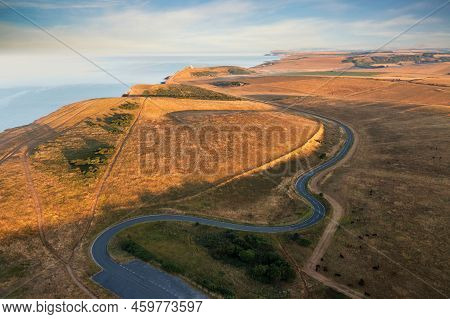 Stunning Aerial Drone Landscape Image Of Golden Hour Over Farmers Fields In South Downs National Par