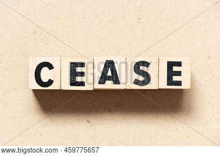 Alphabet Letter Block In Word Cease On Wood Background