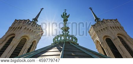 View Of Saint-michel Statue On The Top Of Notre-dame-de-fourviere Basilica In Lyon, France