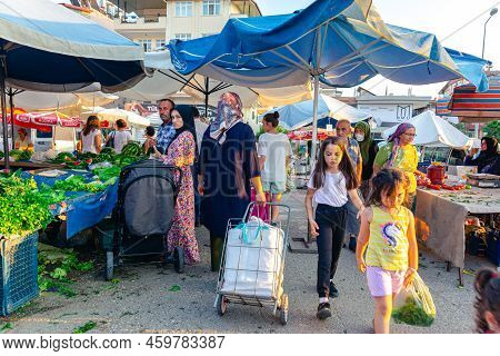 Bazaar In The Turkish City Near Alanya, People Buy Groceries, Vegetables, Fruits