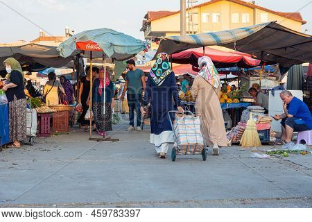 Bazaar In The Turkish City Near Alanya, People Buy Groceries, Vegetables, Fruits