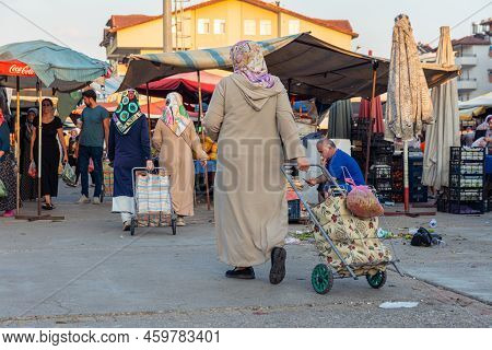 Bazaar In The Turkish City Near Alanya, People Buy Groceries, Vegetables, Fruits