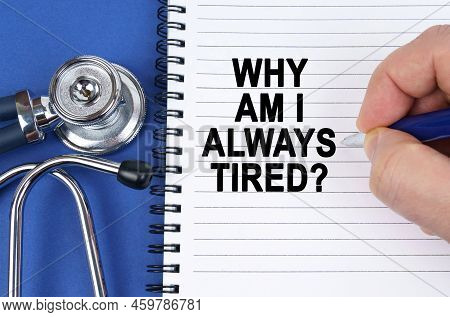 Medical Concept. On A Blue Surface Lies A Stethoscope And A Notebook In Which It Is Written By Hand 