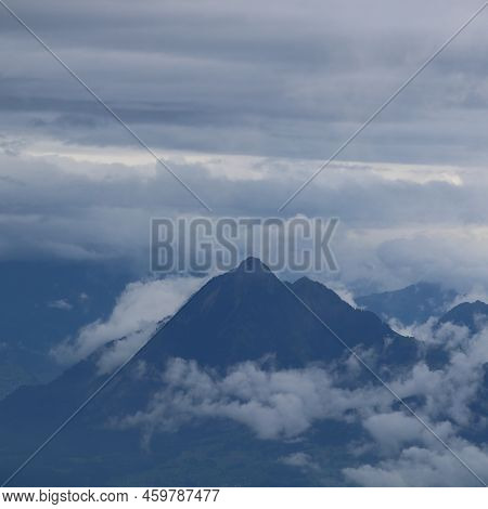 Mount Stanserhorn Surrounded By Clouds. View From Mount Brienzer Rothorn, Switzerland.