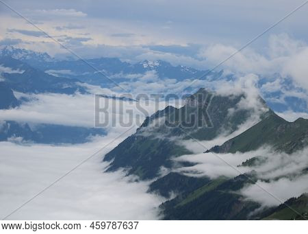 Augstmatthorn Seen From Brienzer Rothorn. Mountain Near Interlaken. Fog Creeping Around.