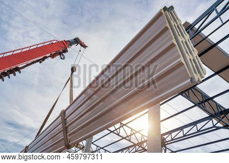 Close Up To The Pu Foam Roof Sheet With A Crane To Lift The Pu Foam Roof Sheet To Install On The Ste
