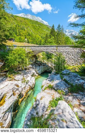 Stone Bridge And Clear Water Of Soca River At Small Soca Gorge, Julian Alps, Slovenia