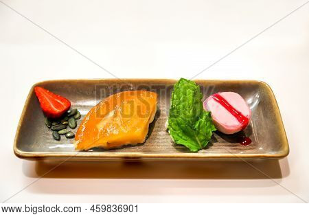 A Bowl With A Delicious Dessert On White Background.