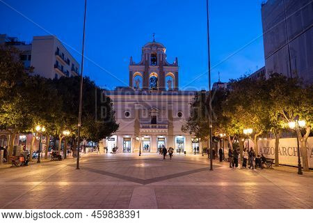 Taranto, Italy - October 28, 2021: Chiesa Del Carmine Church In Centre Of Taranto, Italy With Shops 