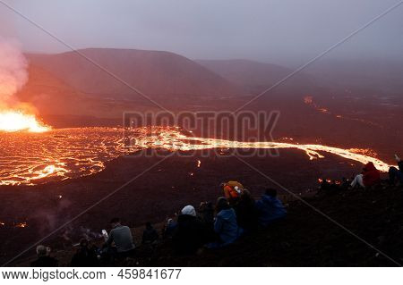 Hikers Watching Meradalir Eruption Of Fagradalsfjall Volcano In Iceland 2022