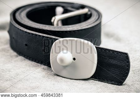 Anti-theft Device Used In Commerce, Anti-theft Tag Or Tag Attached To A Belt, Clothing Protected Aga