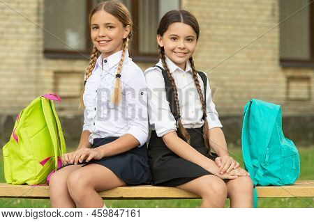 Back To School. Two Happy Teenager Children After School Outdoor. Friendship Of School Girls