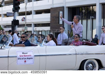 Los Angeles, Ca - August 14 2022:  Los Angeles Mayor Eric Garcetti Rides In A Convertible During The