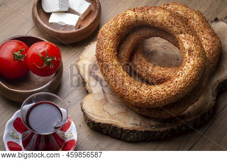 Turkish Fast Food Bagel Called Simit. Turkish Bagel Simit With Sesame. Bagel Is Traditional Turkish 