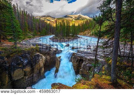 Upper Sunwapta Falls In Autumn, Jasper National Park, Canada. The Water Originates From The Athabasc